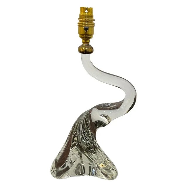 An elegant pair of clear glass table lamps with a swan like neck - they were made by the Belgian glassware company Doyen,...