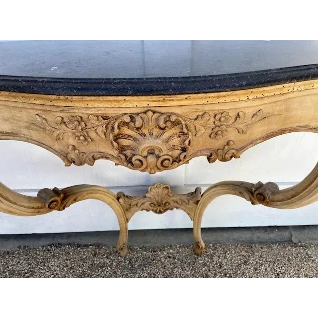 Hard-to-find matching pair of Antique Bleached Oak French Demi-Lunes with Absolute Black marble tops are ready to enhance...