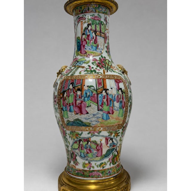 A substantial pair of Chinese export porcelain baluster vases, Qing dynasty, circa 1860–1880, decorated in the richly...