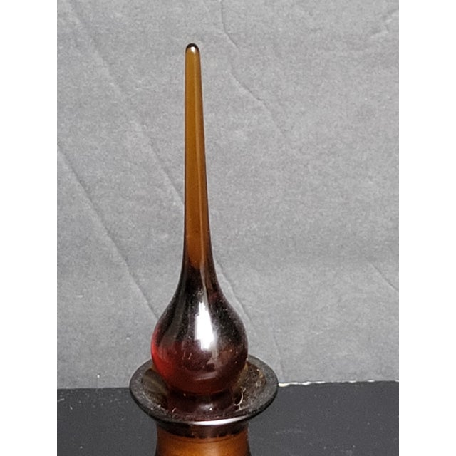 This beautiful 7" perfume bottle is a must-have for any collector of decorative glass and crystal items. The stunning...