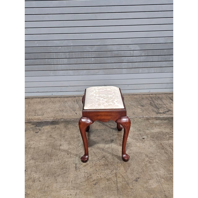 Store Item: Henkel Harris Cherry Footstool Ottoman White Damask Fabric Made In Virginia Description: The footstool...
