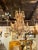 The Patinated Iron and Crystal Chandelier by Ernesto Klun is a stylish and elegant lighting fixture. The chandelier...