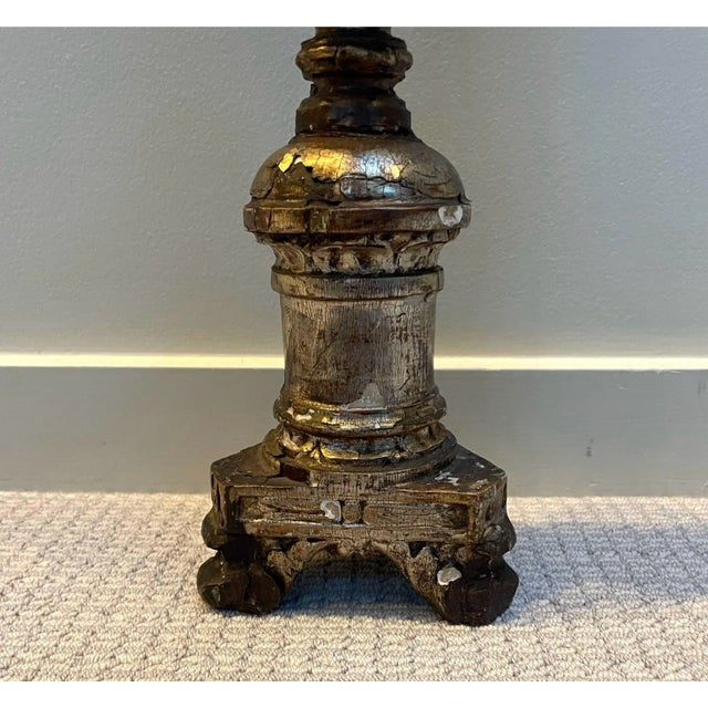 A striking Italian Baroque-style pricket candlestick dating to the late 18th or early 19th century, beautifully crafted in...