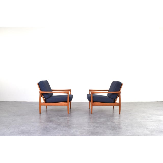 This set of two armchairs was designed in the 1960s by Erik Wørts and manufactured by IKEA in Poland. The frame of the...