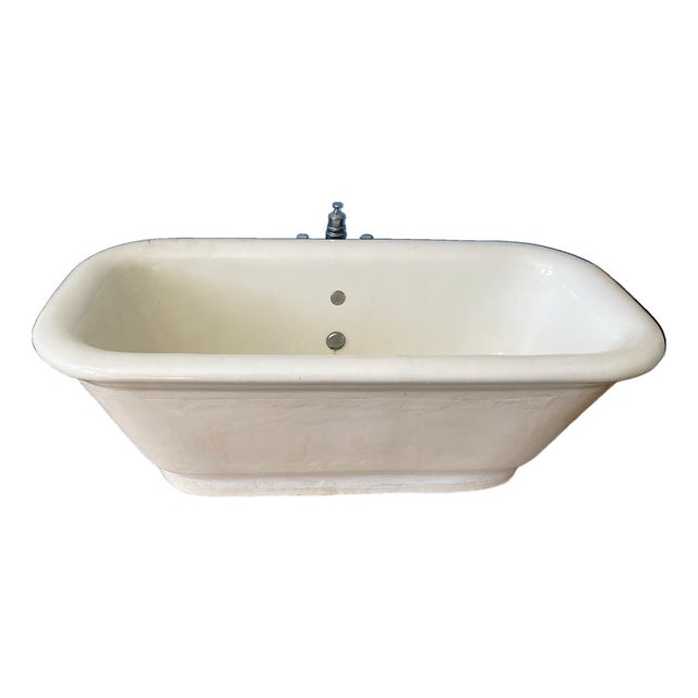Rare J.L.Mott freestanding earthenware double ended bathtub with tubfill and marble base. Marble Floor Measures: 72” Long...