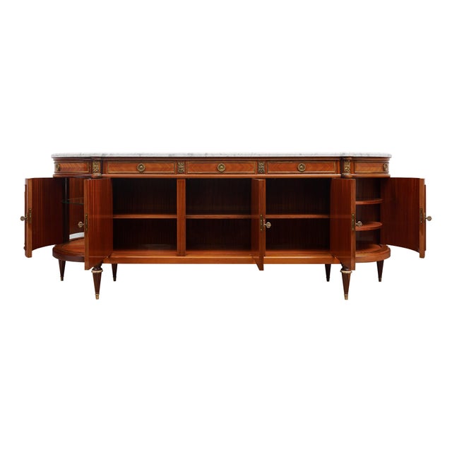 Buffet or enfilade from France made in the Louis XVI style. This piece is made of solid wood construction, primarily...