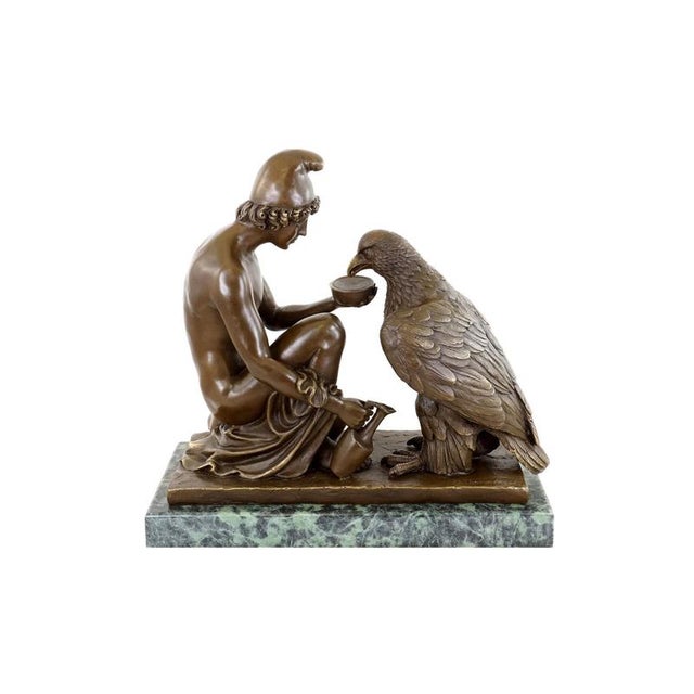 This bronze sculpture depicts the Trojan prince Ganymede offering water to the eagle, the divine form of Zeus. Inspired by...