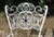 This pair of Russell Woodard patio arm chairs are in the Andalusian pattern. The openwork pattern is reminiscent of a...