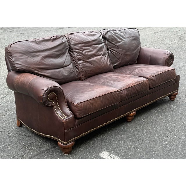 Handsome leather sofa made by Wesley hall for Hickory galleries. Features a super supple leather upholstery, rolled arms,...