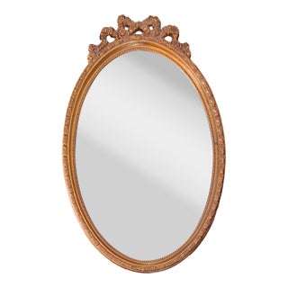 1970s Rococo Style Gold Oval Wall "Bow" Mirror For Sale