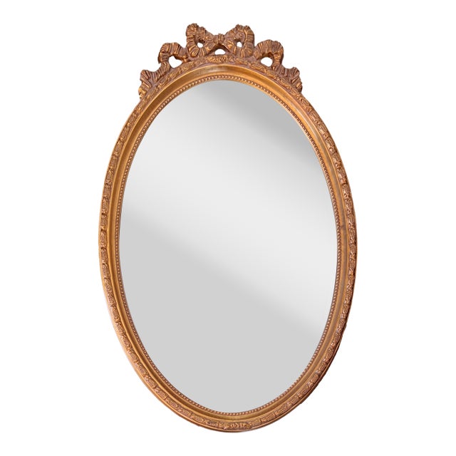 1970s Rococo Style Gold Oval Wall "Bow" Mirror For Sale