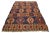 Introducing a beautiful vintage kilim wool rug, meticulously hand-knotted with a captivating geometric design in rust and...