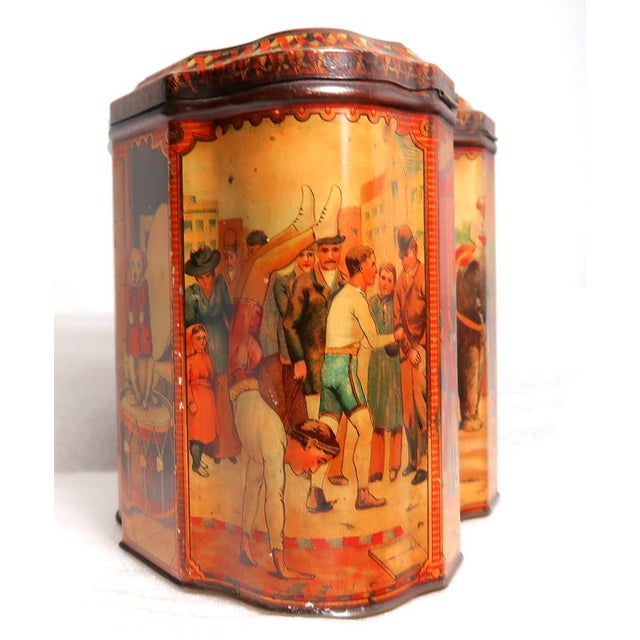 This particular Victorian era Huntley and Palmers Biscuit Tin is quite rare. It is six-sided with a hinged lid that works...