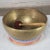 Beautiful singing bowl or standing bowl with a mallet and its playing pillow. Hand-made of bronze or bell metal and...