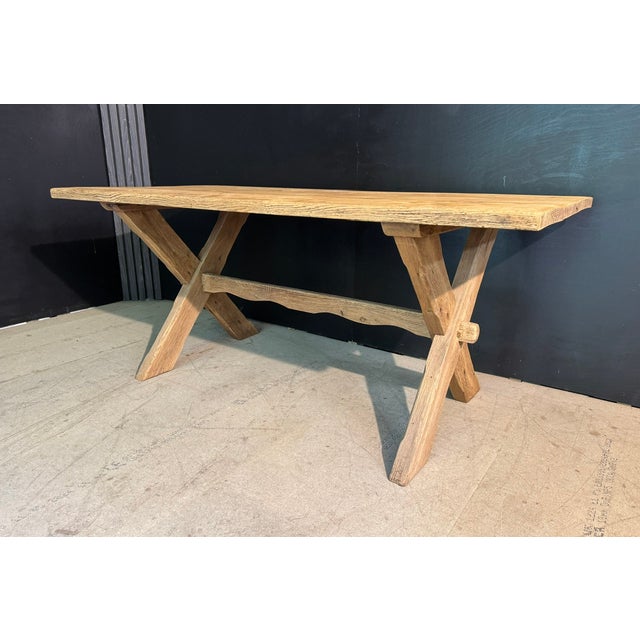 A highly desirable X leg Farmhouse Dining Table. Made from solid Oak and French in origin. Lots of character especially...