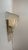 Set of two sconces in clear murano glass, made with the graniglia technique, which produces a granular, textured effect...