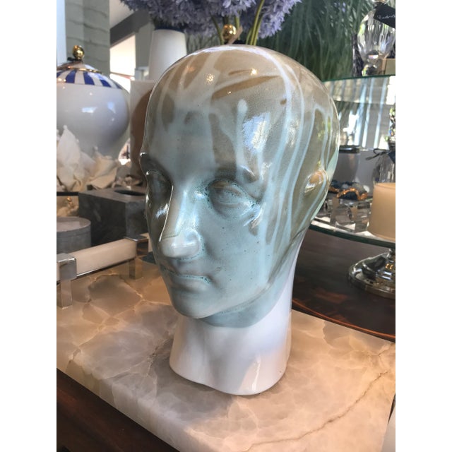 Drip glaze ceramic head. Funky flair accessory!