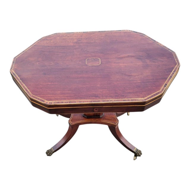 Beautiful 19th-century English Regency jewelry/display table, crafted in rich mahogany with elegant inlaid decoration and...