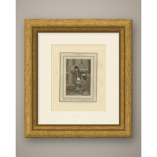 An original antique hand colored copper engraving of a london street seller, lettered "hot spiced gingerbread." below the...