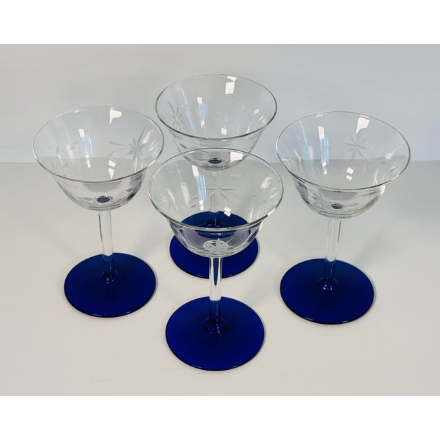 Celebrate classic mid-century elegance with this beautiful set of four vintage coupe stems from the 1960s. Each glass...