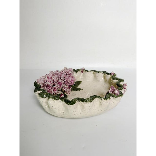 Ceramic trinket dish with floral decoration, France, 1970s. Charming glazed ceramic trinket dish featuring a delicate...