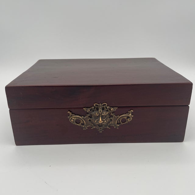 Victorian Period Mahogany Box with brass mount of a mythological lion or the green man on the front, the interior has been...