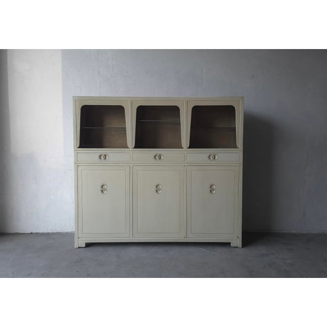 This is a striking dining room cabinet by Michael Taylor for Baker Furniture. This piece is part of his Far East...