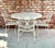 Five piece Mid-Century Wrought Iron Patio set in the style of Salterini. Featuring table and four chairs. 42" round table...