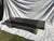 Stainless Steel Bench with attached side tables, great for a brutalist themed home