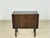 For sale is a stylish vintage chest of drawers from the 1960s. This piece of furniture impresses with its simple mid-...