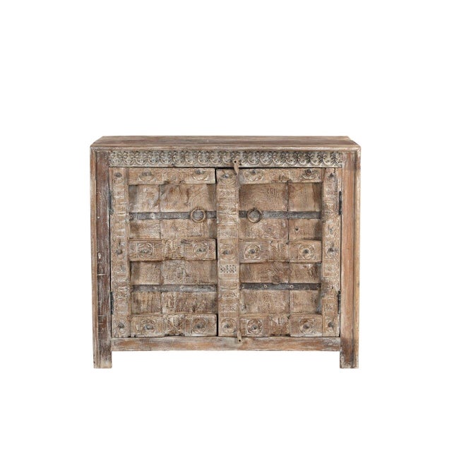 This Cabinet/Buffet has been handcrafted from antique Indian carved door panels and reclaimed wood. The front showcases...