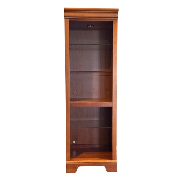 This elegant Stanley Furniture "Bookcase Unit" is crafted by Stanley Furniture with high-quality construction and warm...