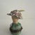 The Lovely Limoges Trinket Box Chapeaux De Paris Vert is a charming and elegant collectible item featuring a green color...