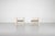 Pair of "Purkersdorf" armchairs in solid white lacquered beech with black woven webbing seats (new webbing). Designed by...