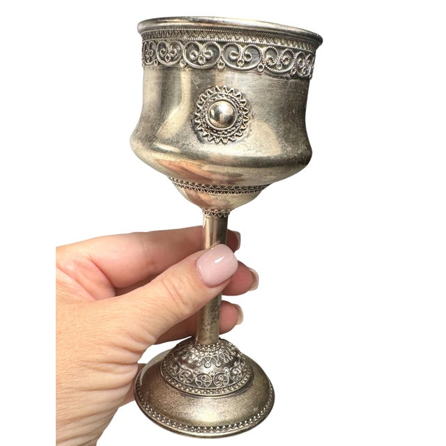 A beautifully crafted mid-century Israeli sterling silver Kiddush cup (ceremonial wine goblet) executed in the iconic...