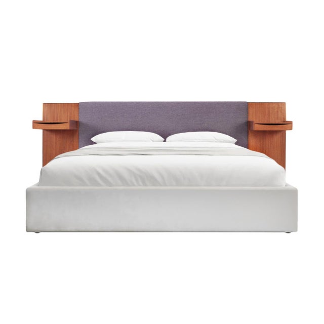 A Paul McCobb for Calvin Irwin upholstered king size bed teak headboard with brass trim and two floating drawers, labeled...