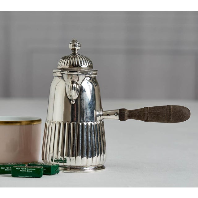 Lovely antique Tiffany & Co. silver plate handled teapot or chocolate pot. The pot is beautifully crafted and makes a...