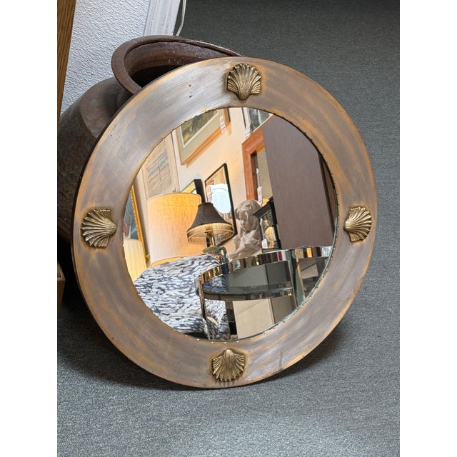 Design Plus Gallery presents a Brass Wall Mirror with Scallop Shells. This mirror with embossed decoration and original...