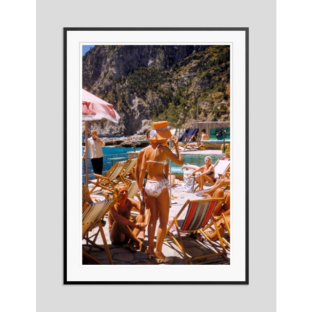 Capri Hat by Toni Frissell Friends bathe in the sun on the coast of Capri, 1959. (Toni Frissell) Archival Pigment Print 60...