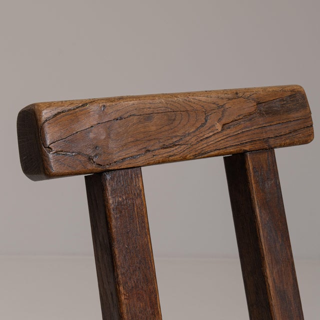 This set of six 1960s Brutalist oak Mobichalet dining chairs from Belgium, made in heavy oak with chunky, sculptural...
