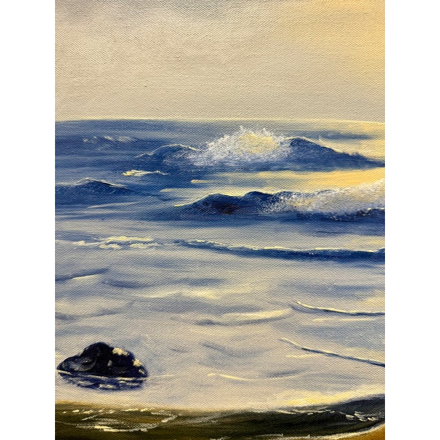 Vintage oil on canvas seascape signed by artist Mary Means. The composition captures waves breaking against a dramatic...