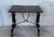 19th century Spanish side table with hand carved lyre leg and iron stretcher. Exquiste antique hand carved lyre-leg walnut...