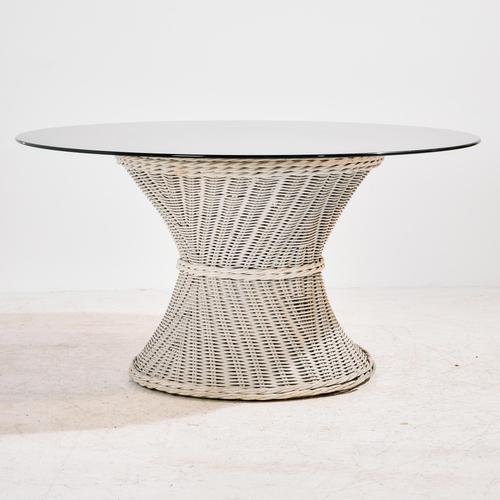 Rattan and bamboo set from the 1970s. The set consists of four armchairs and one dining table. The frame of the chair is...