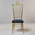 In the tradition of Italian Chiavari craftsmanship, this tall brass side chair features a high spindle back crowned by a...