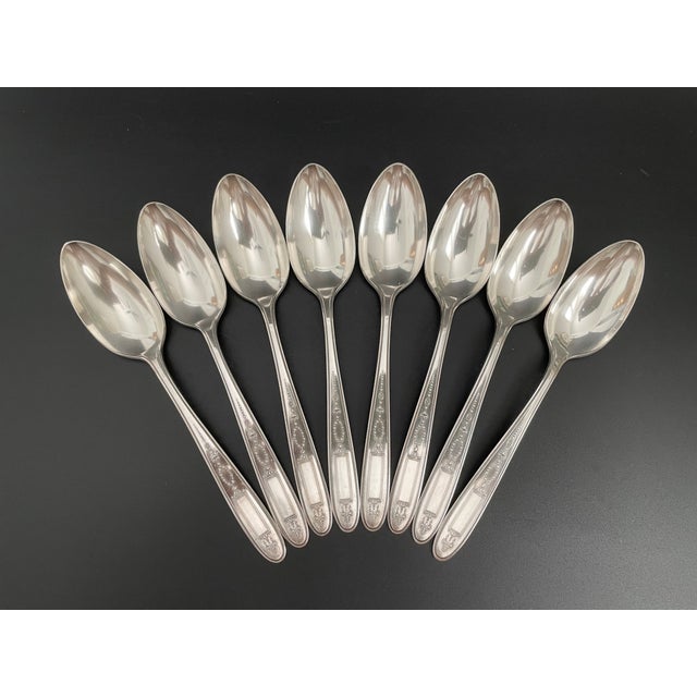A nice set of eight silverplate teaspoons in the Grosvenor pattern by Oneida Community. Designed by Grosvenor N. Allen,...