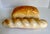 Bring a touch of playful charm to your kitchen, pantry, or café with this vintage pair of highly realistic faux bread...