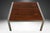 An exceptional MidCentury rosewood and chrome, square Milo Baughman style coffee table. It is designed in the classic...