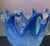 Beautiful Italian art glass decorative bowl featuring rich blue tones and an eye-catching sculptural form. The substantial...