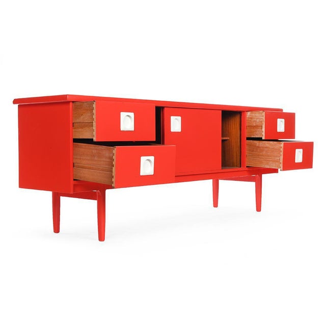 Console in red lacquered wood. Vintage storage cabinet in purple lacquered wood. It has 2 cupboards and 4 drawers. This...