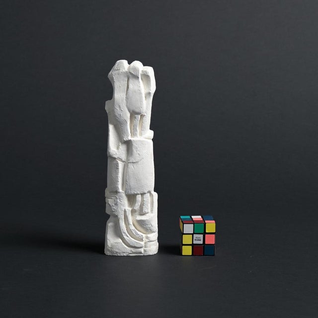 This abstract sculpture in plaster was made by the Belgian artist Jan Keustermans. The sculpture has a rough plaster...